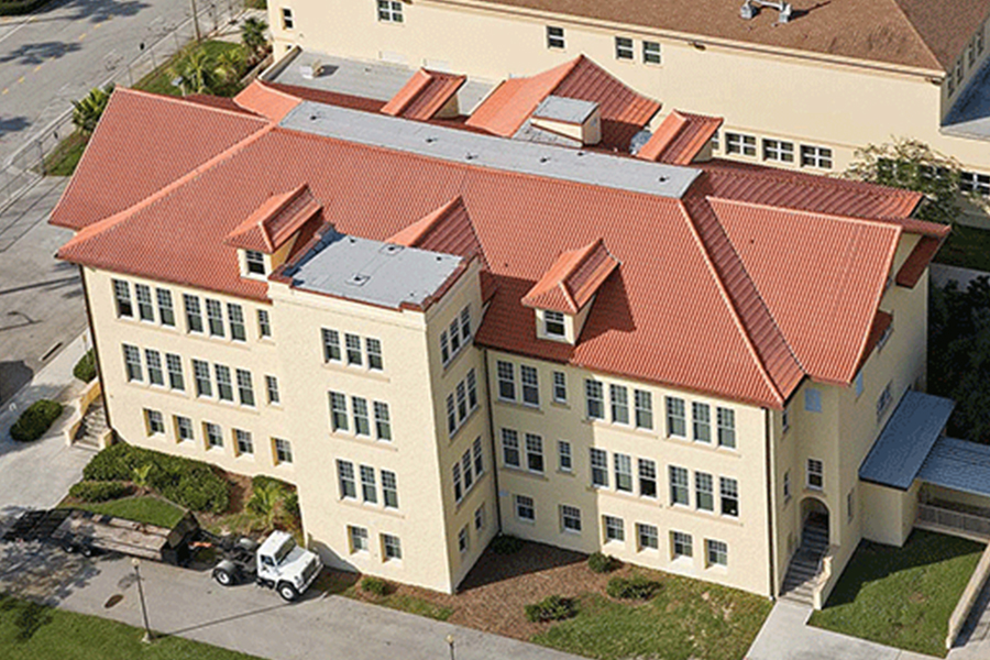 commercial tile roofing for hotel building by bravo's roofing