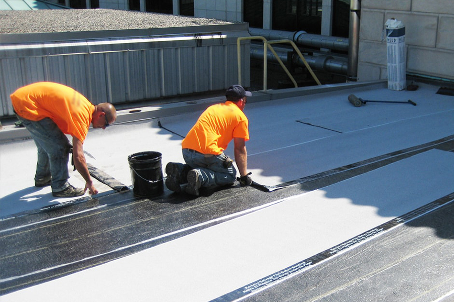 modified bitumen roof job being completed by bravo's roofing